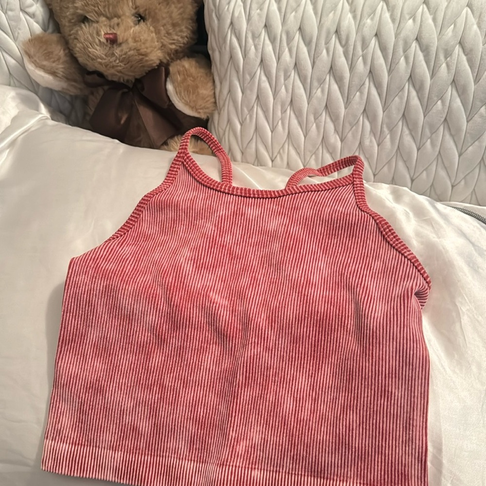 New. Never worn. Fits like a small.